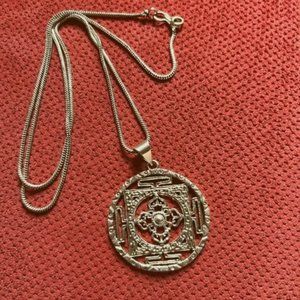 Brass Chakra Pendant from Tibet